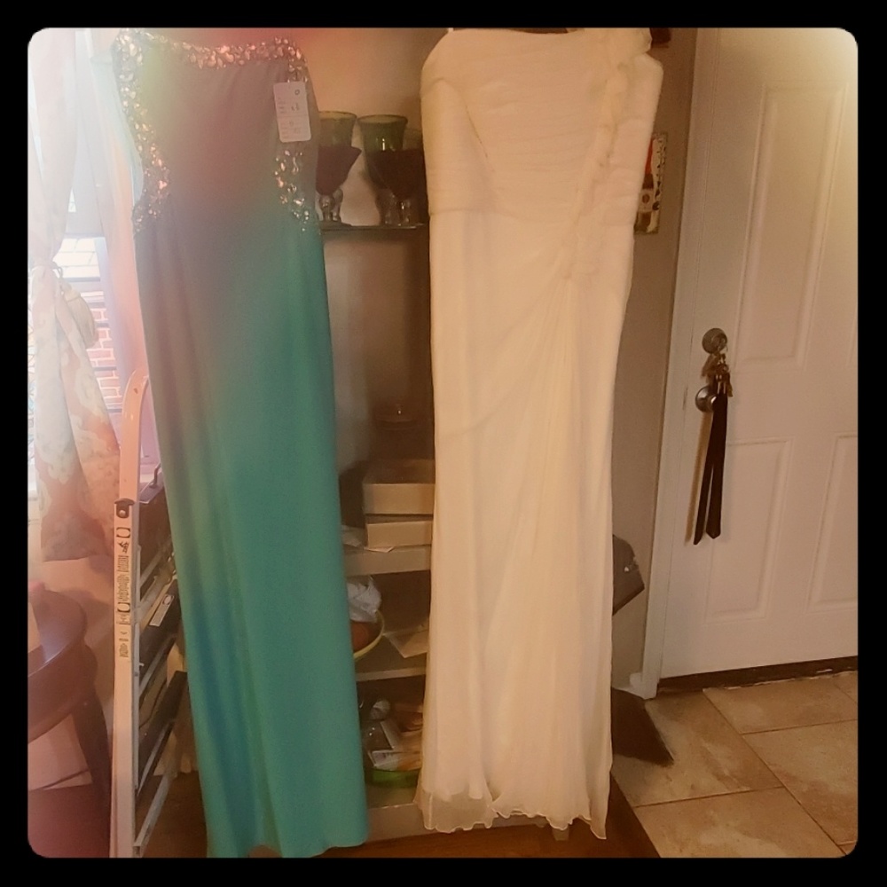 Brand new Prom gowns with tags